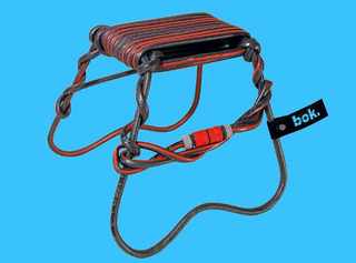 Illustration for article titled Hosepipe and Electrical Cord Furniture is No Wind-Up